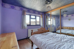 Bedroom One- click for photo gallery